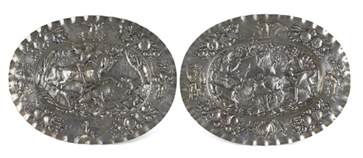 Pair of Continental 800 silver platters, late 19th century, with hunting scenes in high relief, 103 troy ounces. Image courtesy Pook & Pook Inc.